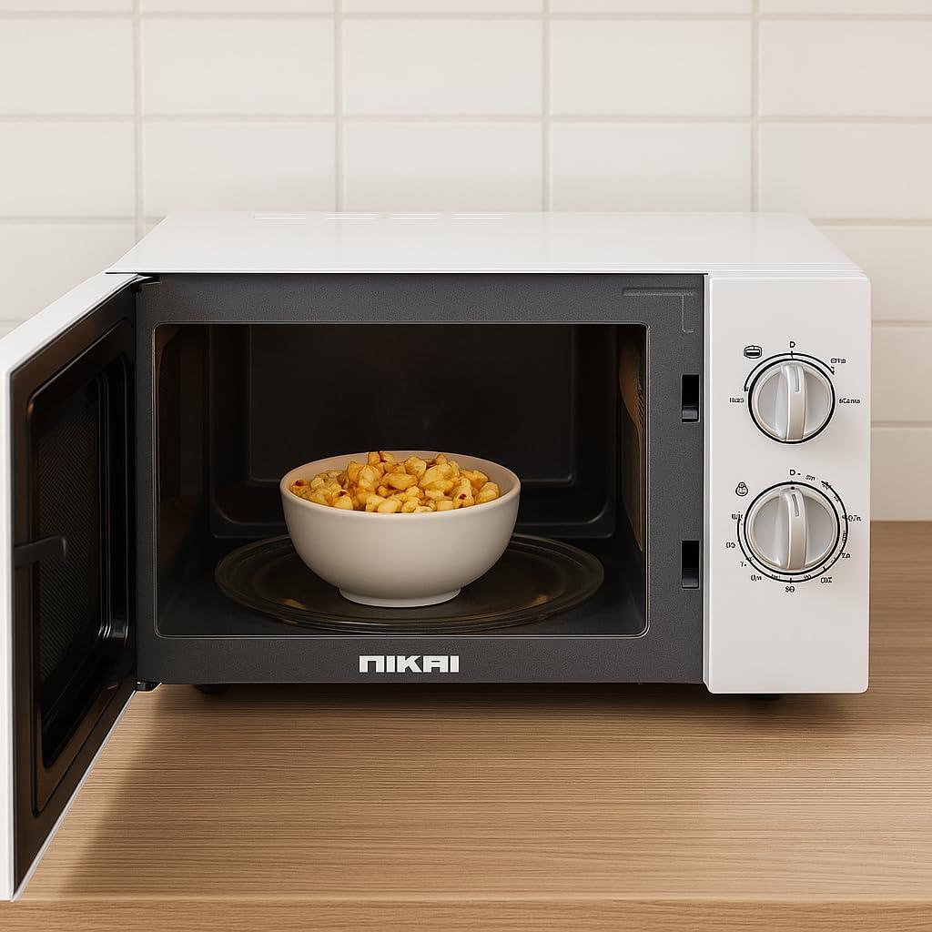 Nikai Microwave Oven, Manual Control, 5 Power Levels, 0-35 Mins Timer, Defrost Setting, Cooking End Signal, Pull Handle Door 30L 900W NMO3010M White thumbnail 4